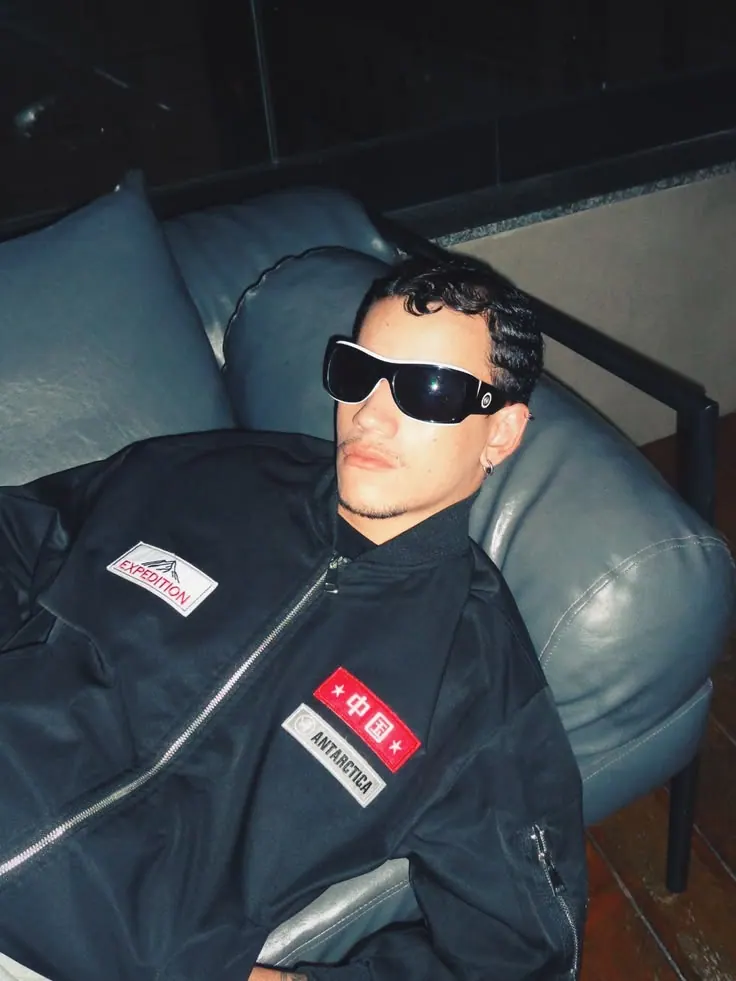 An all-black look in an industrial interior — men's portrait