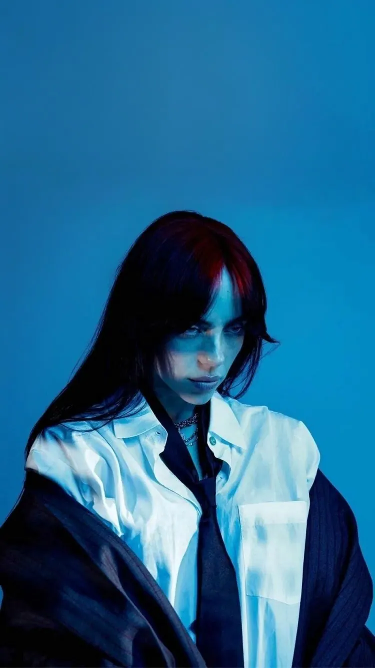 A white shirt in deep blue light — women's portrait