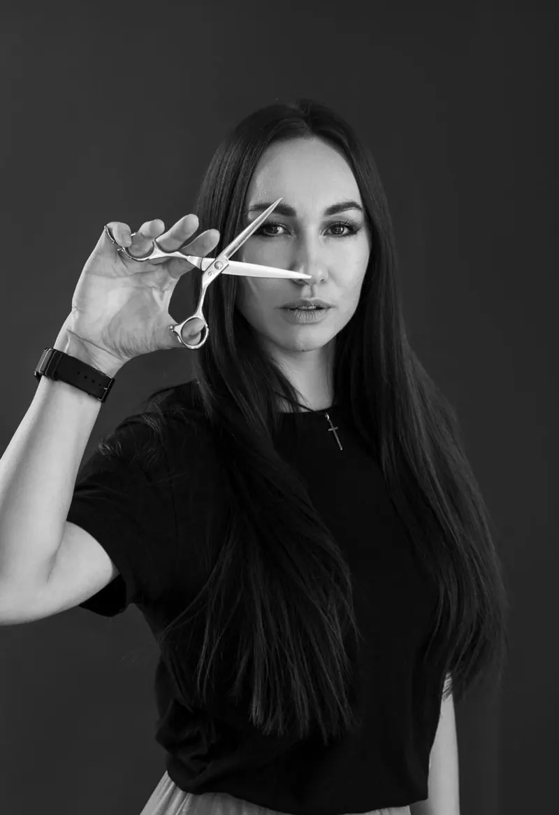 Hairdresser photoshoot — hairdresser scissors in a black and white portrait
